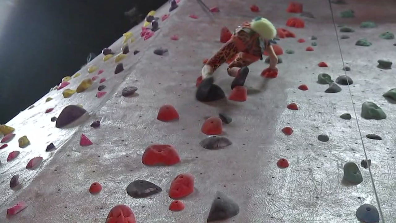 Get out of the sun and into the rock climbing gym